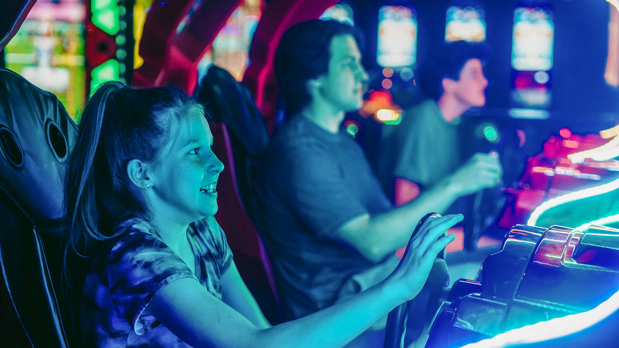 People enjoying arcade games on Akihabara Retro Gaming & Anime Group Walking Tour.