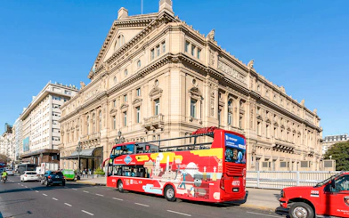 Hop on Hop off bus passing Teatro Colón, Buenos Aires.