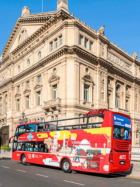 Hop on Hop off bus passing Teatro Colón, Buenos Aires.
