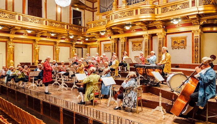 Orchestra performing in Vienna's Musikverein Golden Hall.