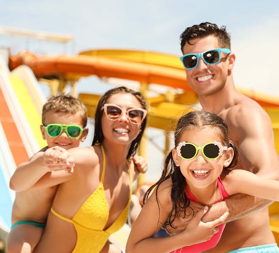 Family enjoying slides at A'Famosa Waterpark, Malaysia.