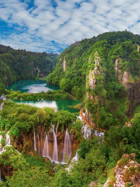 Plitvice Lakes waterfalls and lush greenery viewed from Zadar.