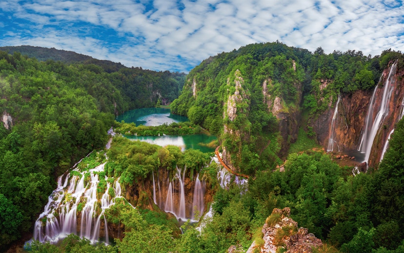 Plitvice Lakes waterfalls and lush greenery viewed from Zadar.