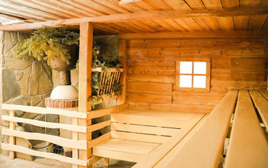 Wooden sauna interior at Terma Bania in Białka Tatrzańska, Poland.