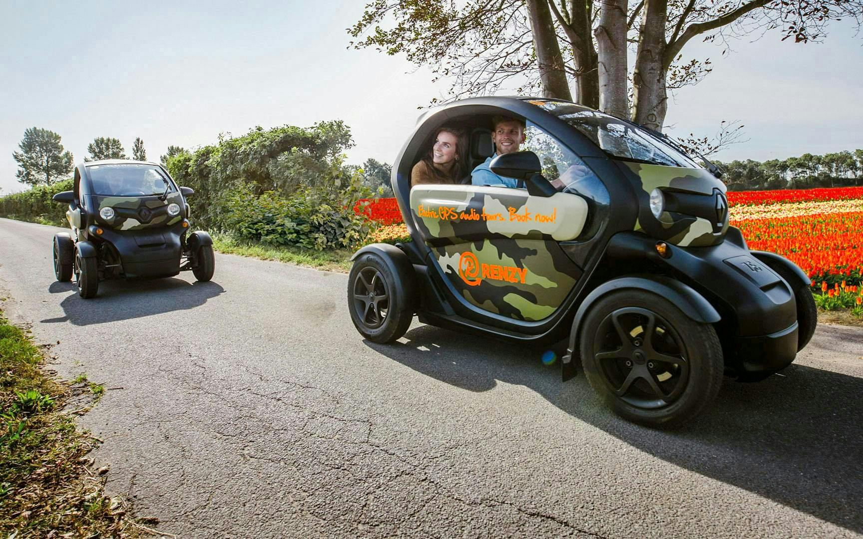 Electric cars on a self-drive audio tour through Keukenhof tulip fields.