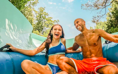 Visitors enjoying Big Daddy Falls ride at Water Country USA.