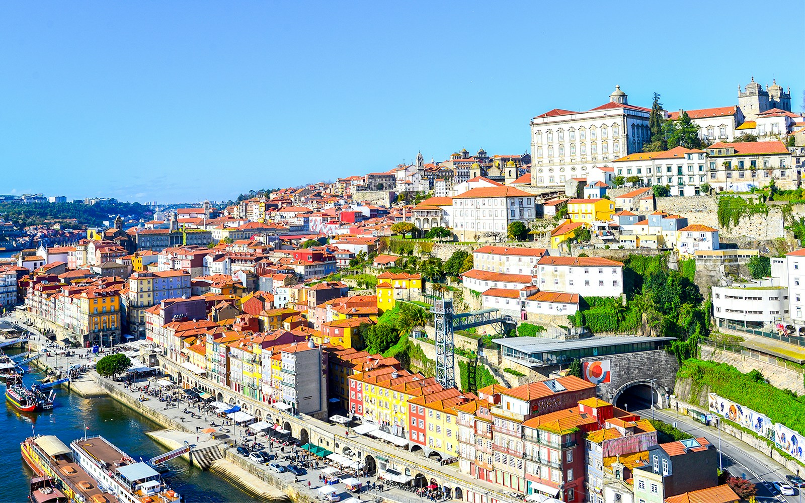 Ribeira Riverside hop-on hop-off bus near Douro River in Porto, Portugal.