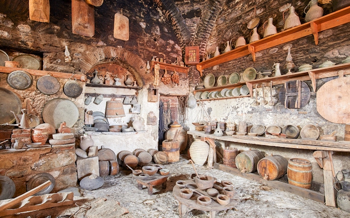 Great Meteoron Holy Monastery interior with ancient kitchenware and pottery.
