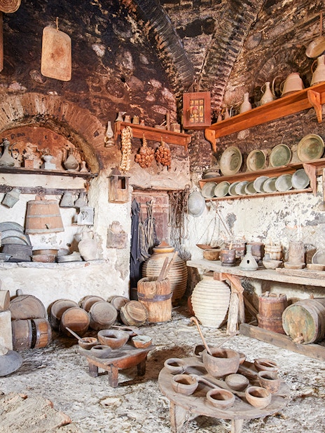 Great Meteoron Holy Monastery interior with ancient kitchenware and pottery.