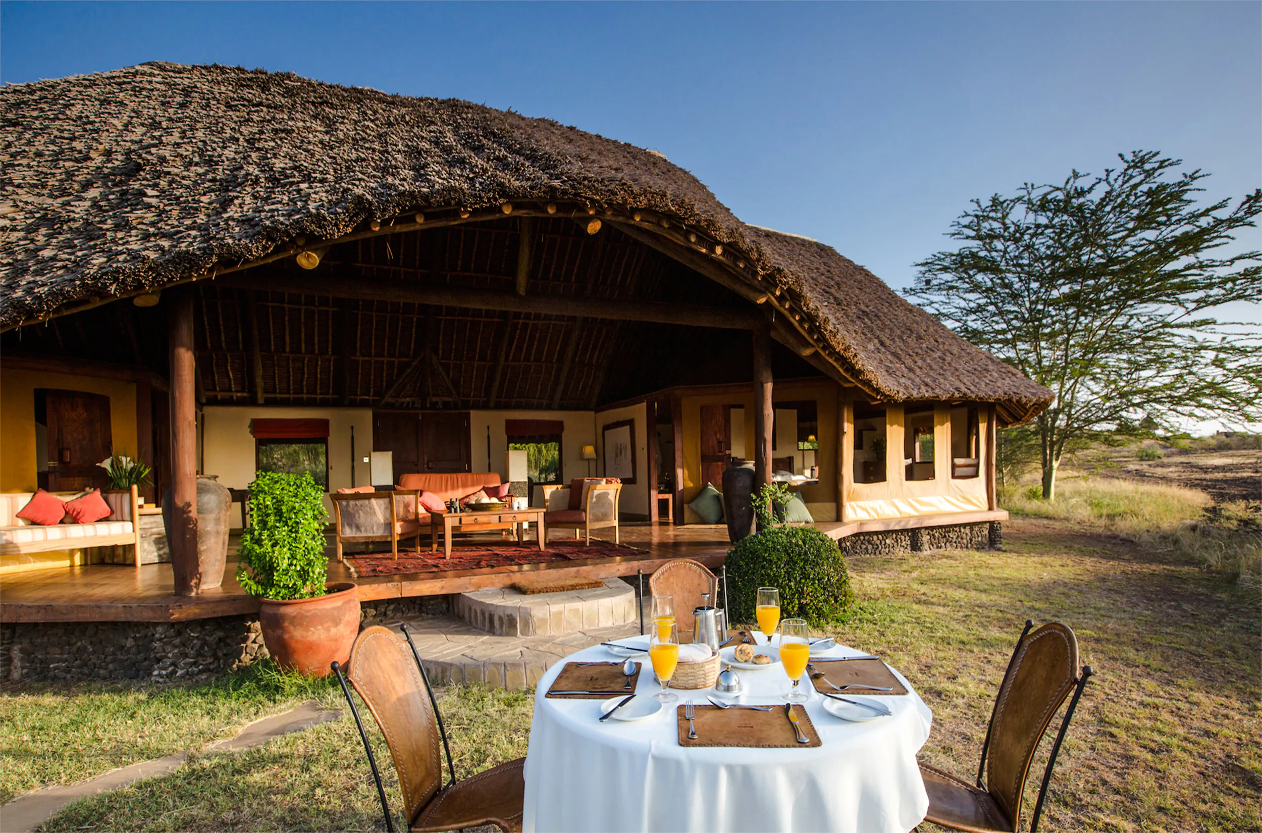 Outdoor dining setup at a lodge in Amboseli, Kenya, part of the 2 Days Amboseli Express Safari from Nairobi.