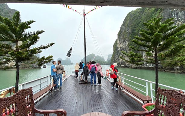 Ha Long Bay limestone karsts and emerald waters on a 3-star cruise, Route 1 day tour.