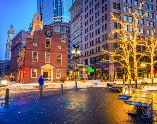 Freedom Trail Boston at night with Old State House and holiday lights.