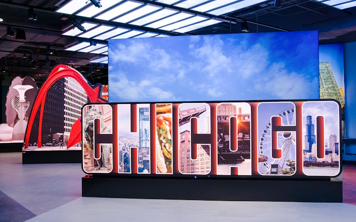 Skydeck Chicago exhibit featuring iconic city landmarks and Willis Tower.