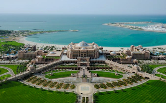 Emirates Palace with gardens and beach, Abu Dhabi Tour from Dubai.