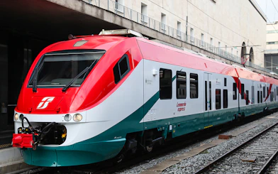 Leonardo Express train at station for Fiumicino Airport transfers, Rome, Italy.