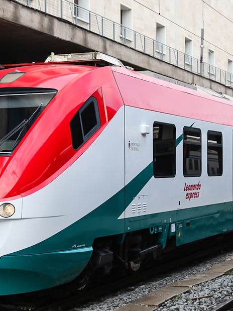 Leonardo Express train at station for Fiumicino Airport transfers, Rome, Italy.