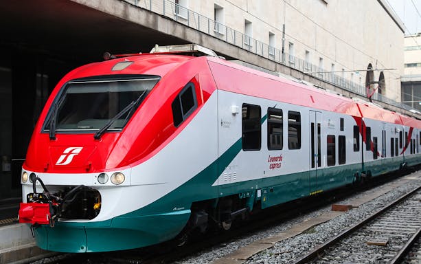 Leonardo Express train at station for Fiumicino Airport transfers, Rome, Italy.