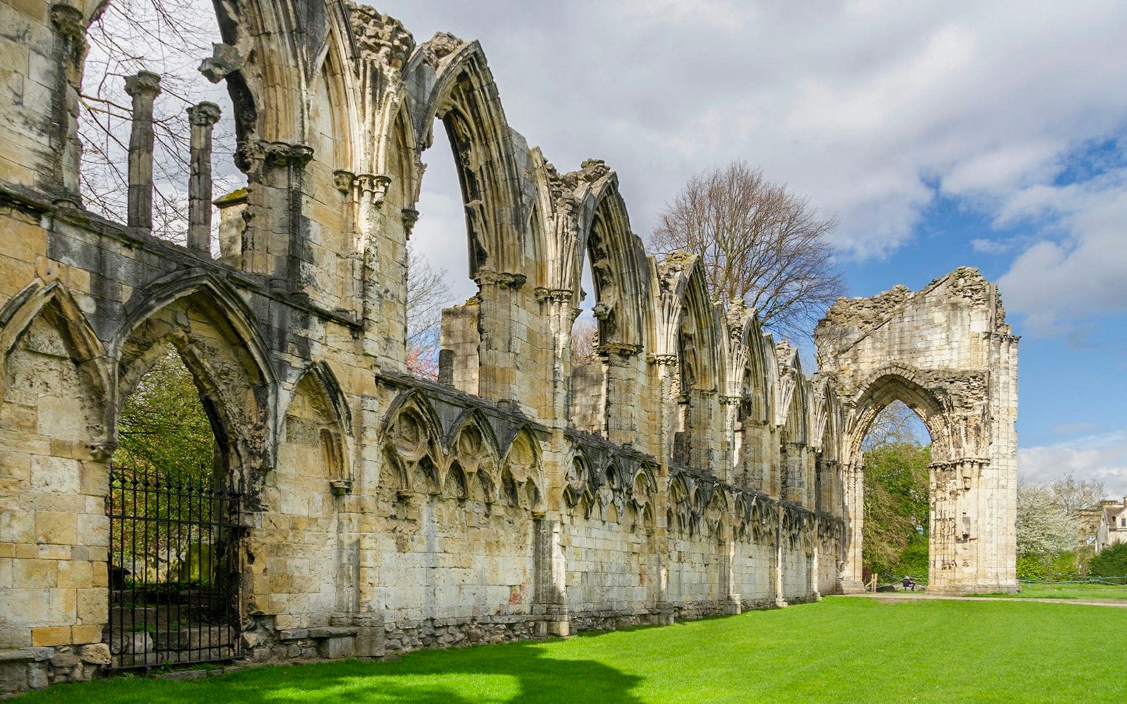 York Museum Gardens with ancient ruins and lush greenery on a summer day.