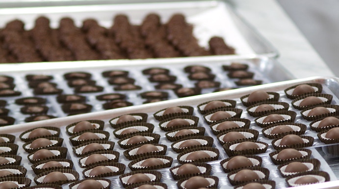 Chocolate truffles being prepared at Choco-Story Paris.