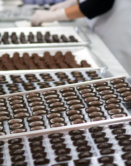 Chocolate truffles being prepared at Choco-Story Paris.