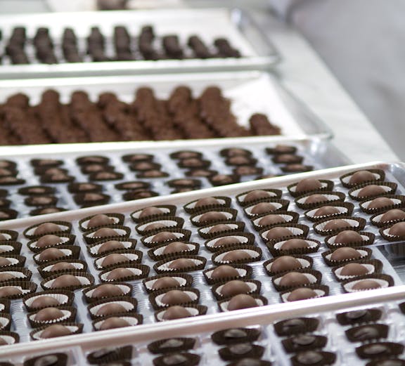 Chocolate truffles being prepared at Choco-Story Paris.