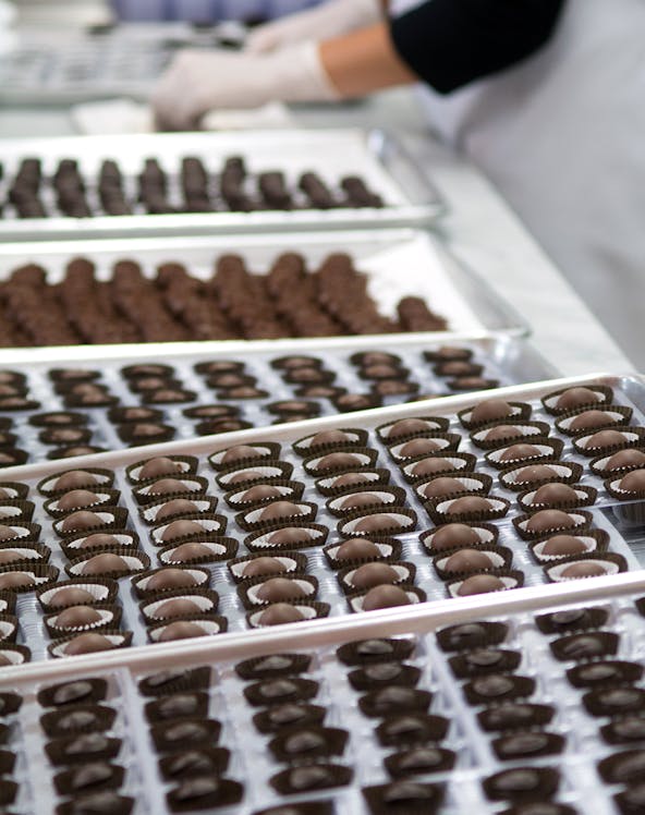 Chocolate museum exhibit with cocoa beans and chocolate bars, Choco-Story Paris.