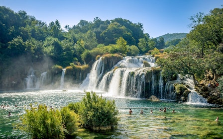 From Split: Krka National Park Guided Day Trip with Boat Ride and Swimming