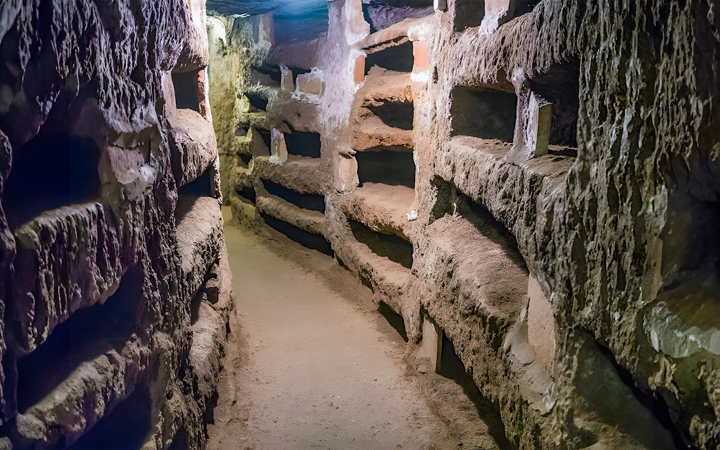 Ancient underground passage in the Catacombs of St. Callixtus, Rome.