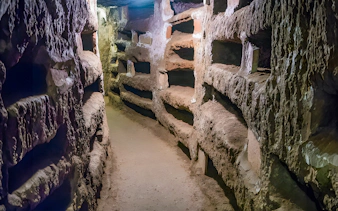 Ancient underground passage in the Catacombs of St. Callixtus, Rome.