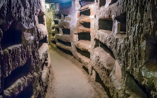 Ancient underground passage in the Catacombs of St. Callixtus, Rome.