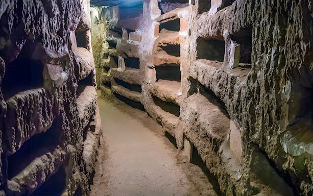 Ancient underground passage in the Catacombs of St. Callixtus, Rome.