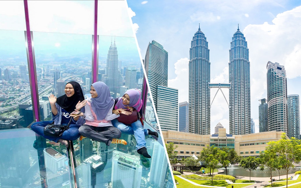 Visitors enjoying the glass sky deck with a view of Kuala Lumpur skyline and Petronas Towers.