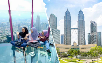 Visitors enjoying the glass sky deck with a view of Kuala Lumpur skyline and Petronas Towers.