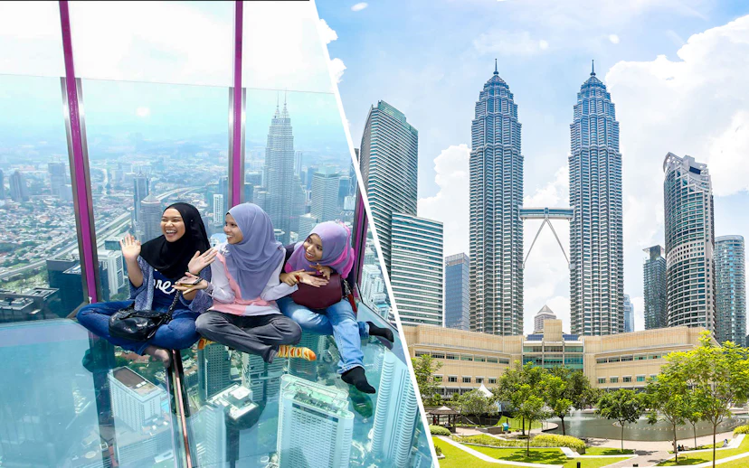 Visitors enjoying the glass sky deck with a view of Kuala Lumpur skyline and Petronas Towers.