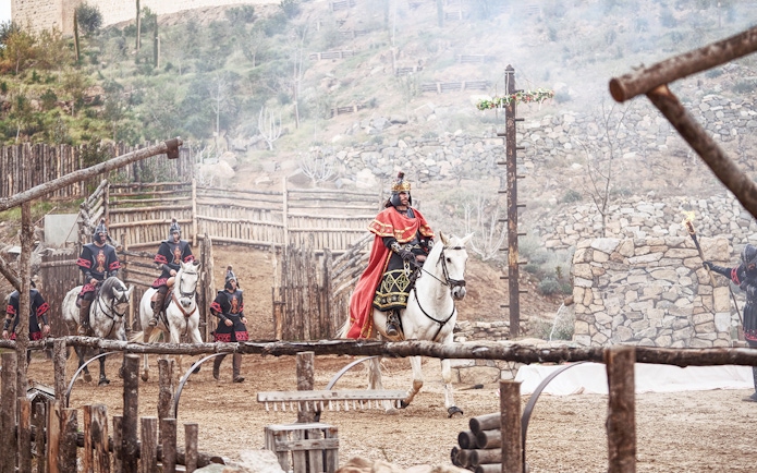 Riders in historical costumes on horseback at El Misterio De Sorbaces, Puy du Fou España.