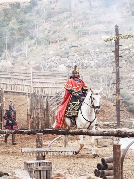 Riders in historical costumes on horseback at El Misterio De Sorbaces, Puy du Fou España.
