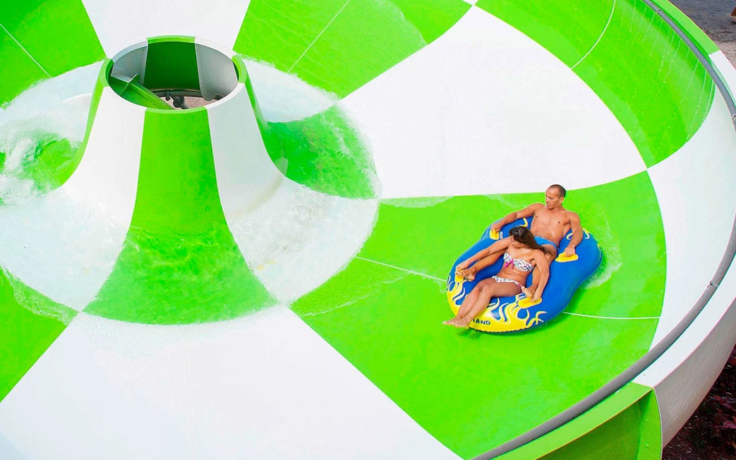 Visitors on a water slide at Aqualand Maspalomas.
