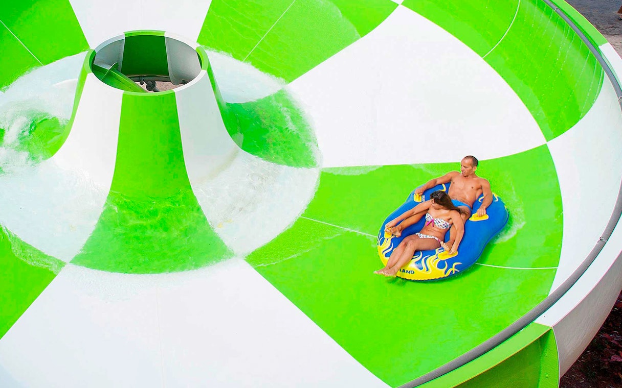 Visitors on a water slide at Aqualand Maspalomas.
