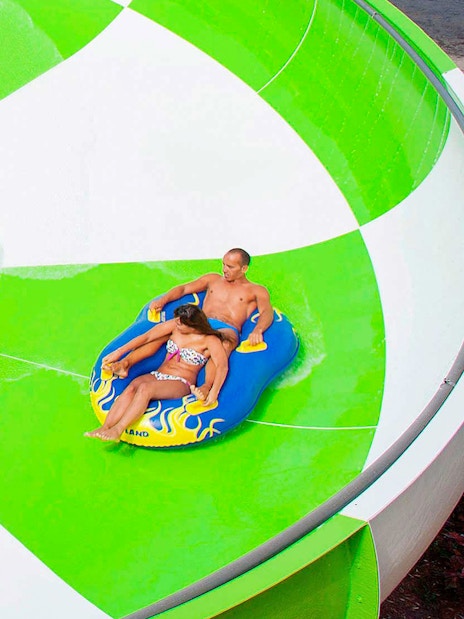 Visitors on a water slide at Aqualand Maspalomas.