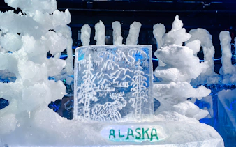 Ice sculpture with Alaska engraving at Chena Hot Springs tour.