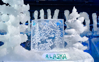 Ice sculpture with Alaska engraving at Chena Hot Springs tour.