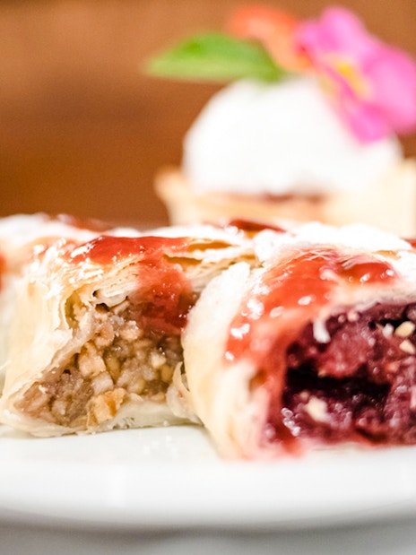 Hungarian pastries with fruit and nut fillings on a plate, Budapest Danube River cruise.