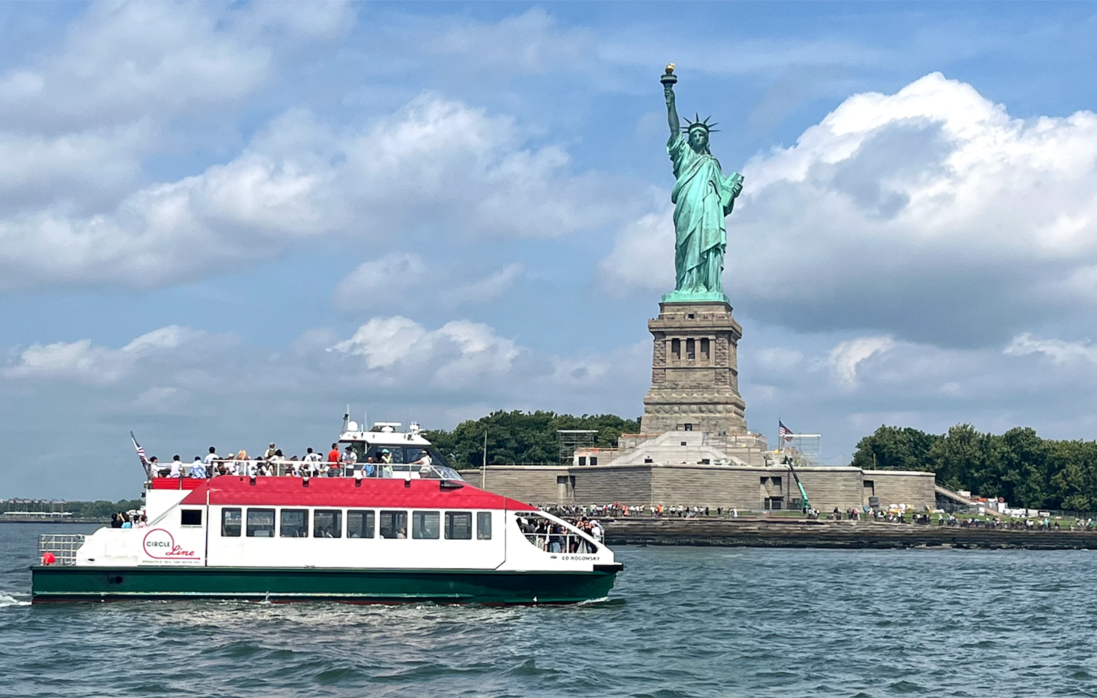 Circle Line boat near Statue of Liberty, New York City.