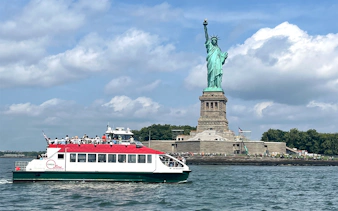 Circle Line boat near Statue of Liberty, New York City.