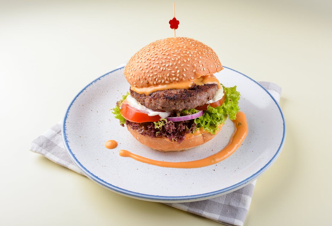 chef handmade grilled wagyu beef cheesy burger