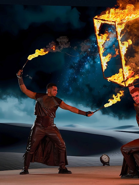 Fire performers at Noble Camp Desert Safari showcasing live entertainment.
