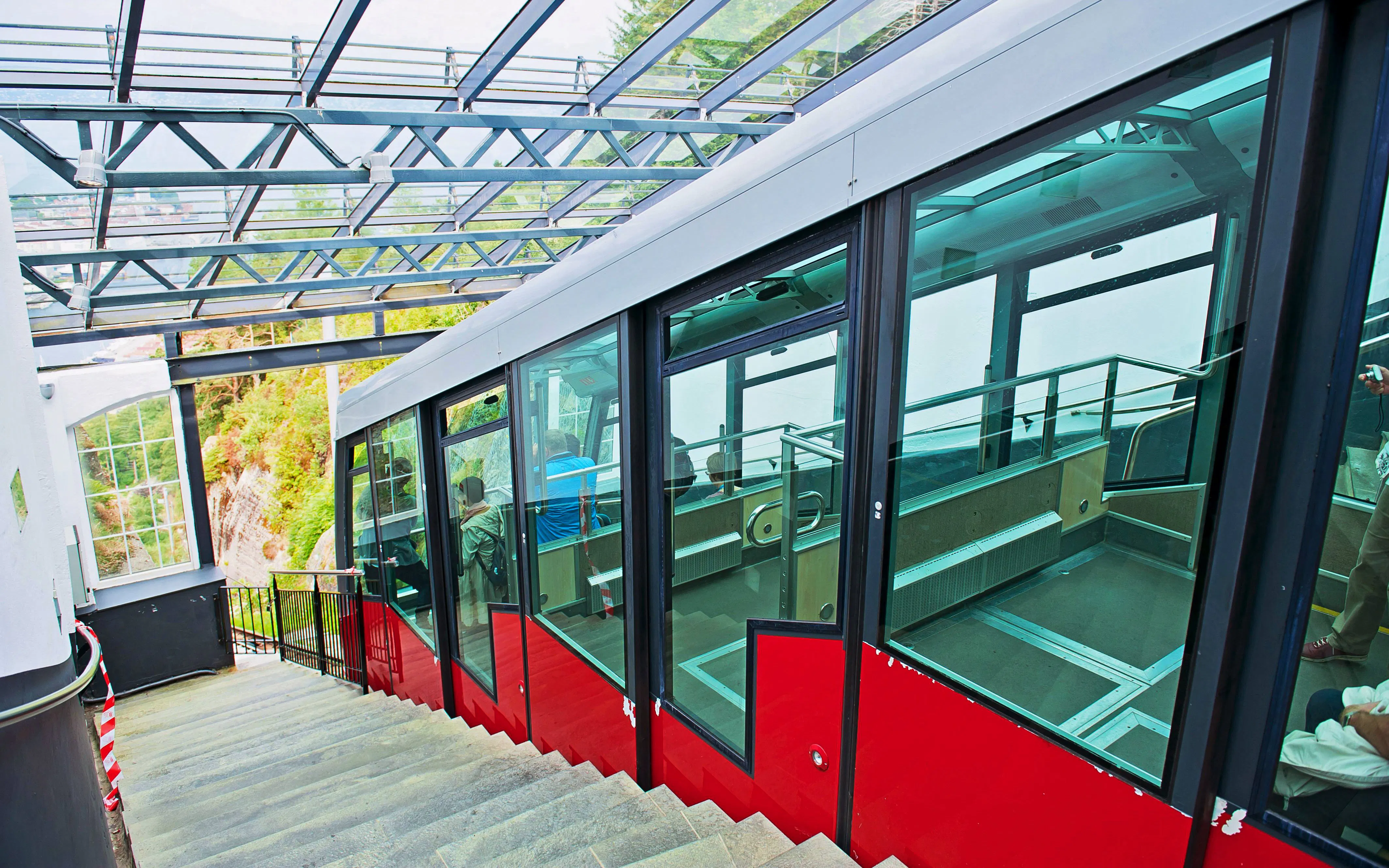 Funicular at Mount Floyen station in Bergen, Norway, with passengers inside.