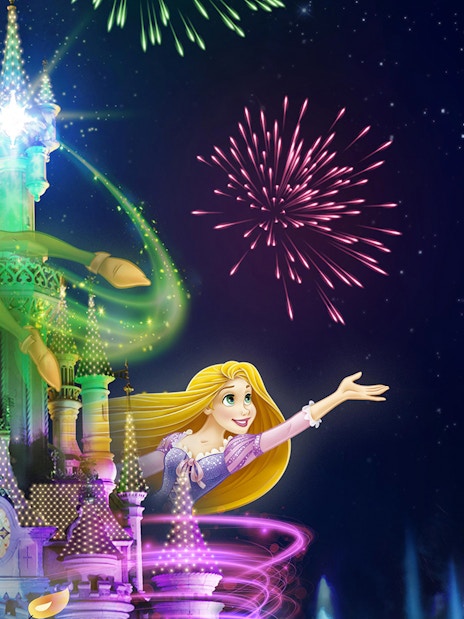 Fireworks over a castle with animated characters flying, Disneyland Paris.