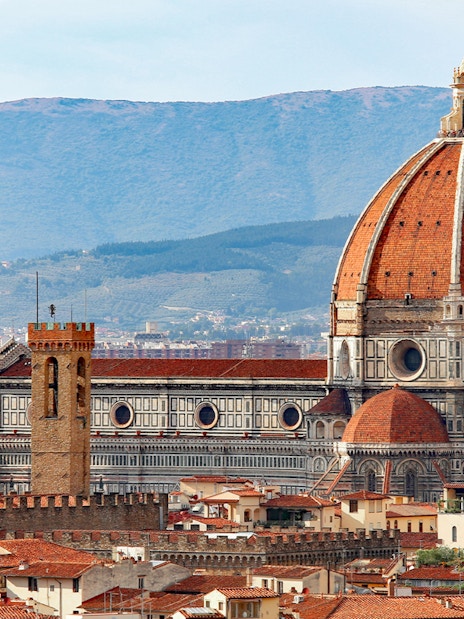 Aerial view of Florence Cathedral with its iconic dome and bell tower.