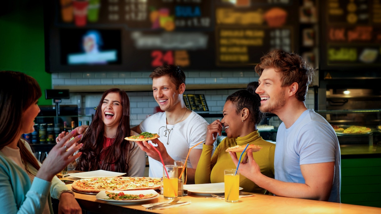 Friends having pizza